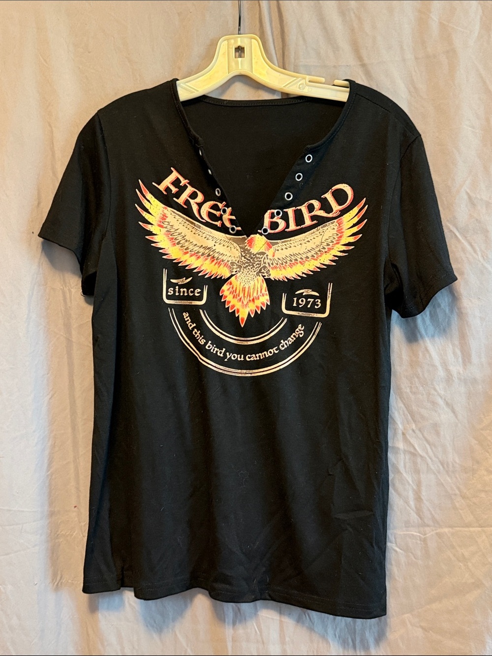 Amazon Black Short Sleeve Tee with Yellow-Orange Bird Graphic